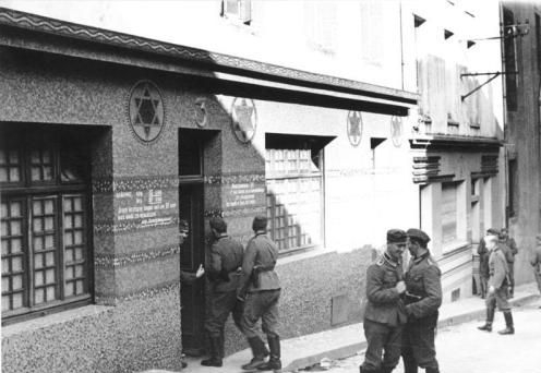 German soldiers entering a synagogue in Brest that has been converted into a “Soldatenbordell” (military brothel) in 1940